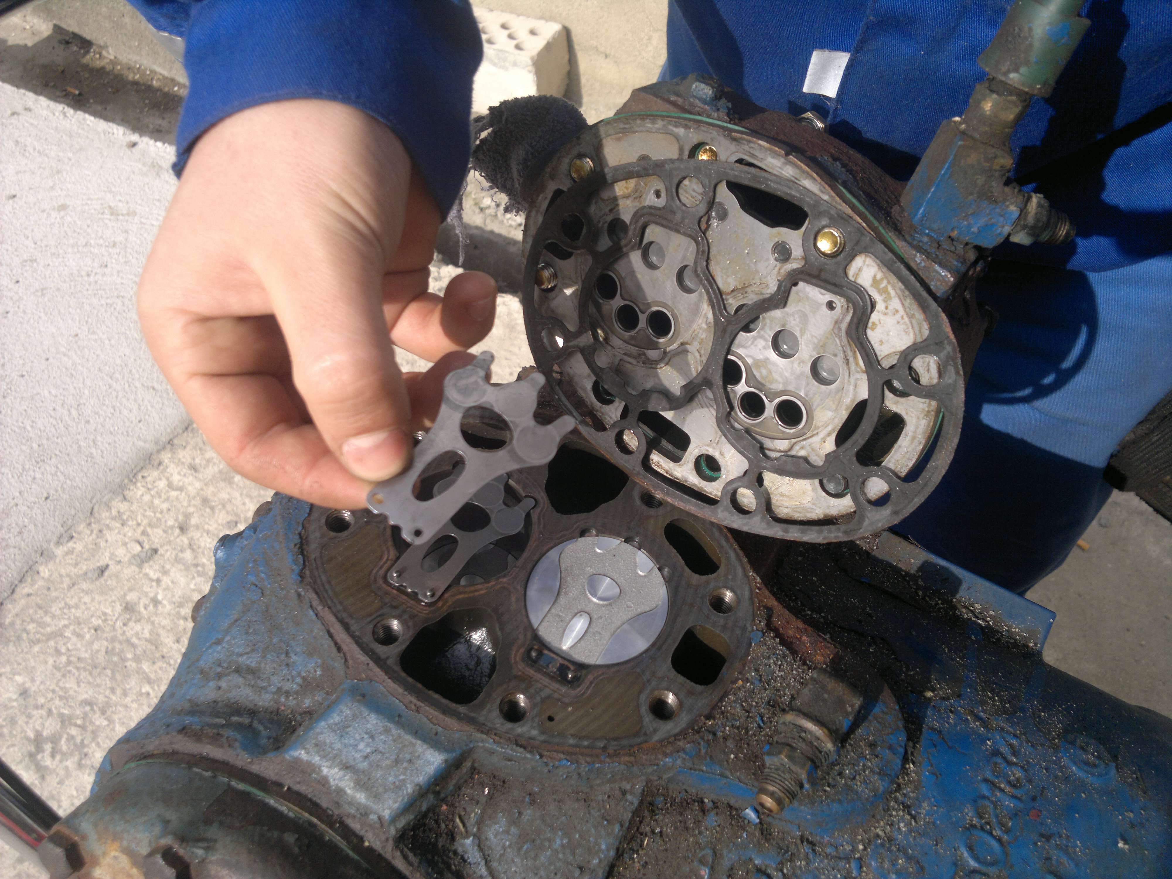 Removal of the CARLYLE 06DR41 compressor for further repair — after