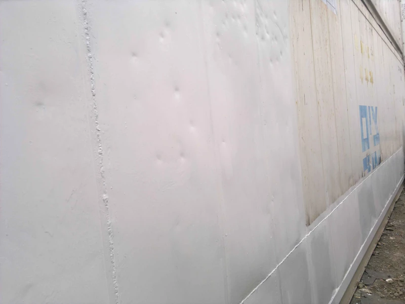 Installation of new external cladding of the container